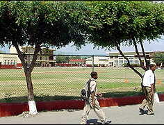 Wolmer’s Boys, built around a cricket oval. BBC News, 11 March 2002