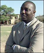 Dave Myrie, principal of Wolmer’s Boys. BBC News, 15 March 2002