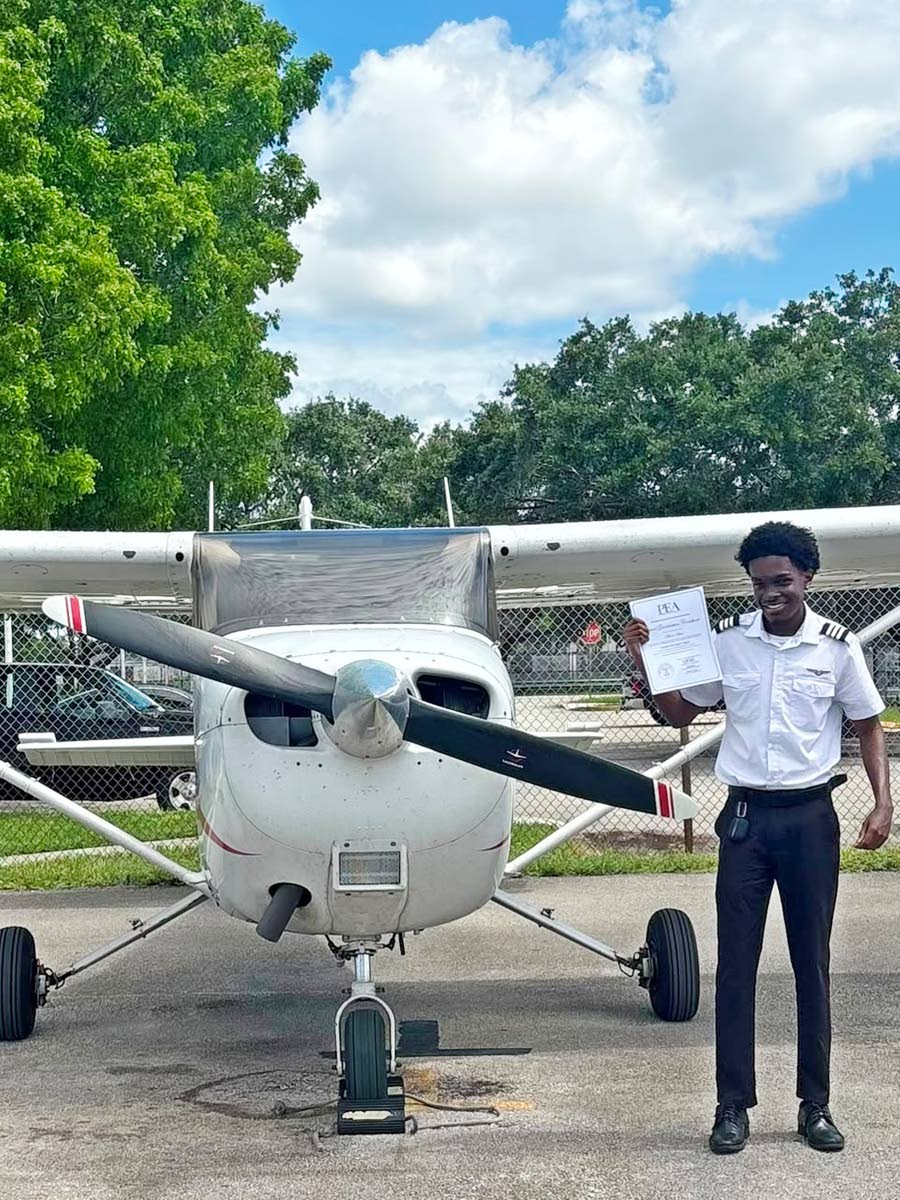 Mikhail Grey with a course completion certificate for his instrument rating. Jamaica Gleaner, 26 August 2026.