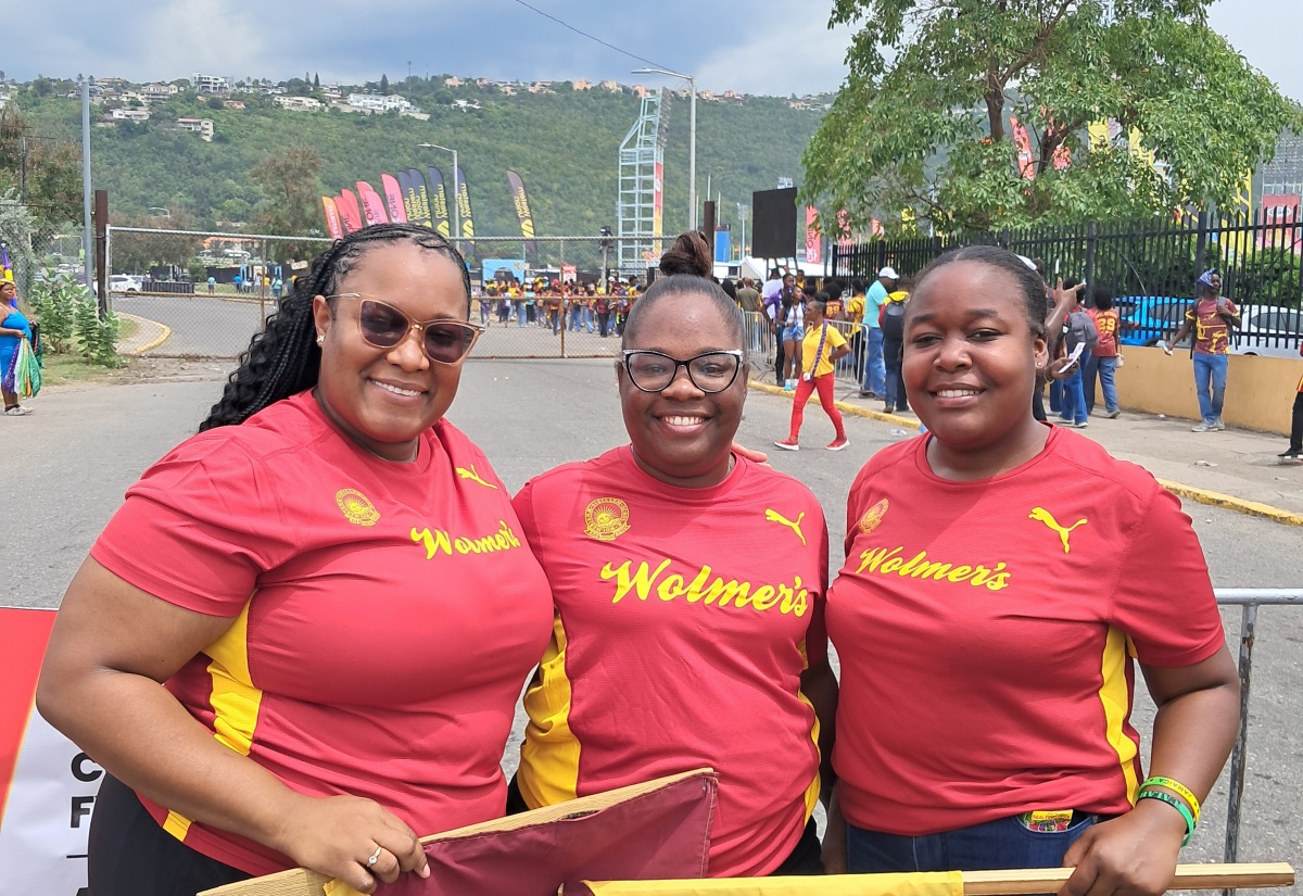 Members of the administrative staff at Wolmer’s Schools (from left) Tylo Palmer, Nickola Dennis, and Kahepha Miller, at Champs, 27 March 2026. Photo: Britney Stevens / JIS