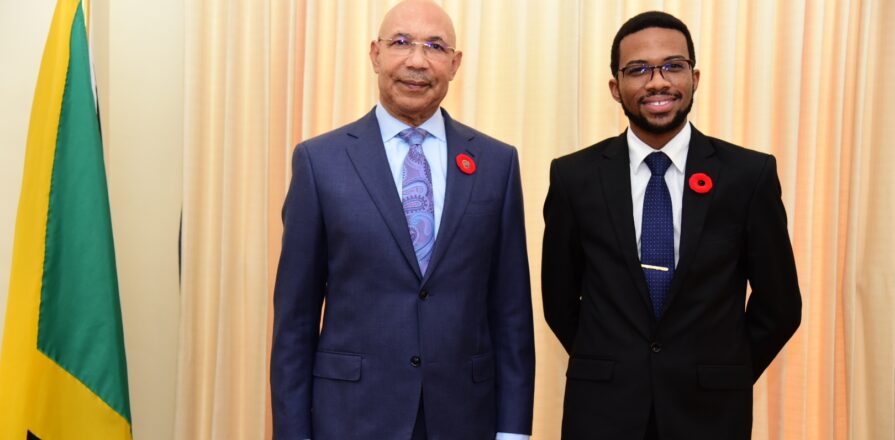 Governor-General Sir Patrick Allen with 2023 Rhodes Scholar David Rhoden Salmon. Photo: Adrian Walker / JIS