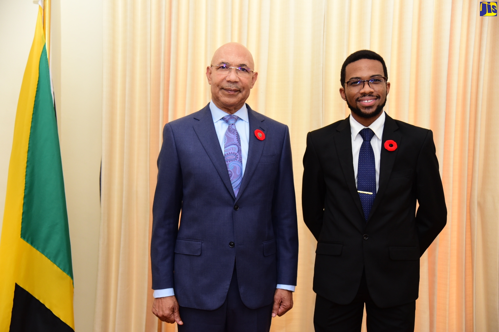 Governor-General Sir Patrick Allen with 2023 Rhodes Scholar David Rhoden Salmon. Photo: Adrian Walker / JIS