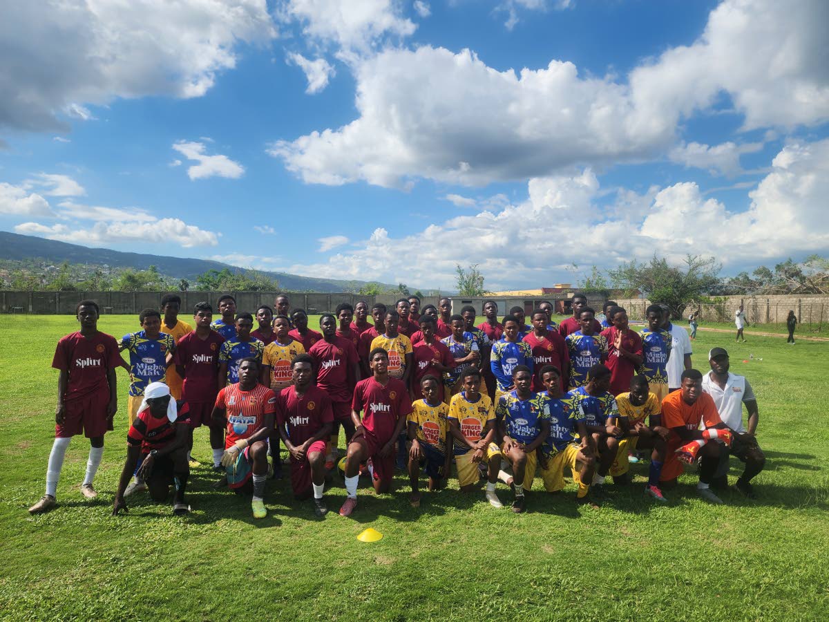 Members of the Wolmer’s Boys’ School Manning Cup team show solidarity with St Elizabeth Technical High School’s daCosta Cup players. Jamaica Gleaner
