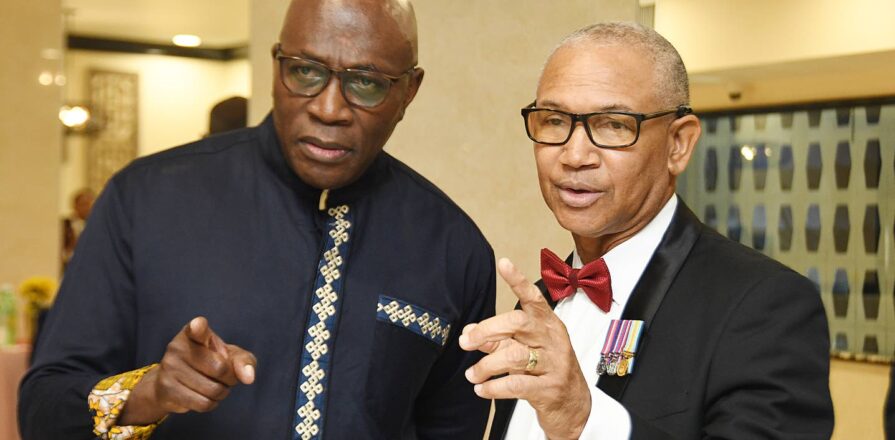 Chief Justice Bryan Sykes (left) with Colonel Rohan Robinson, president of the Wolmer’s Old Boys’ Association, at the WOBA 120th anniversary awards banquet. Photo: Naphtali Junior / Jamaica Observer, 10 September 2026.