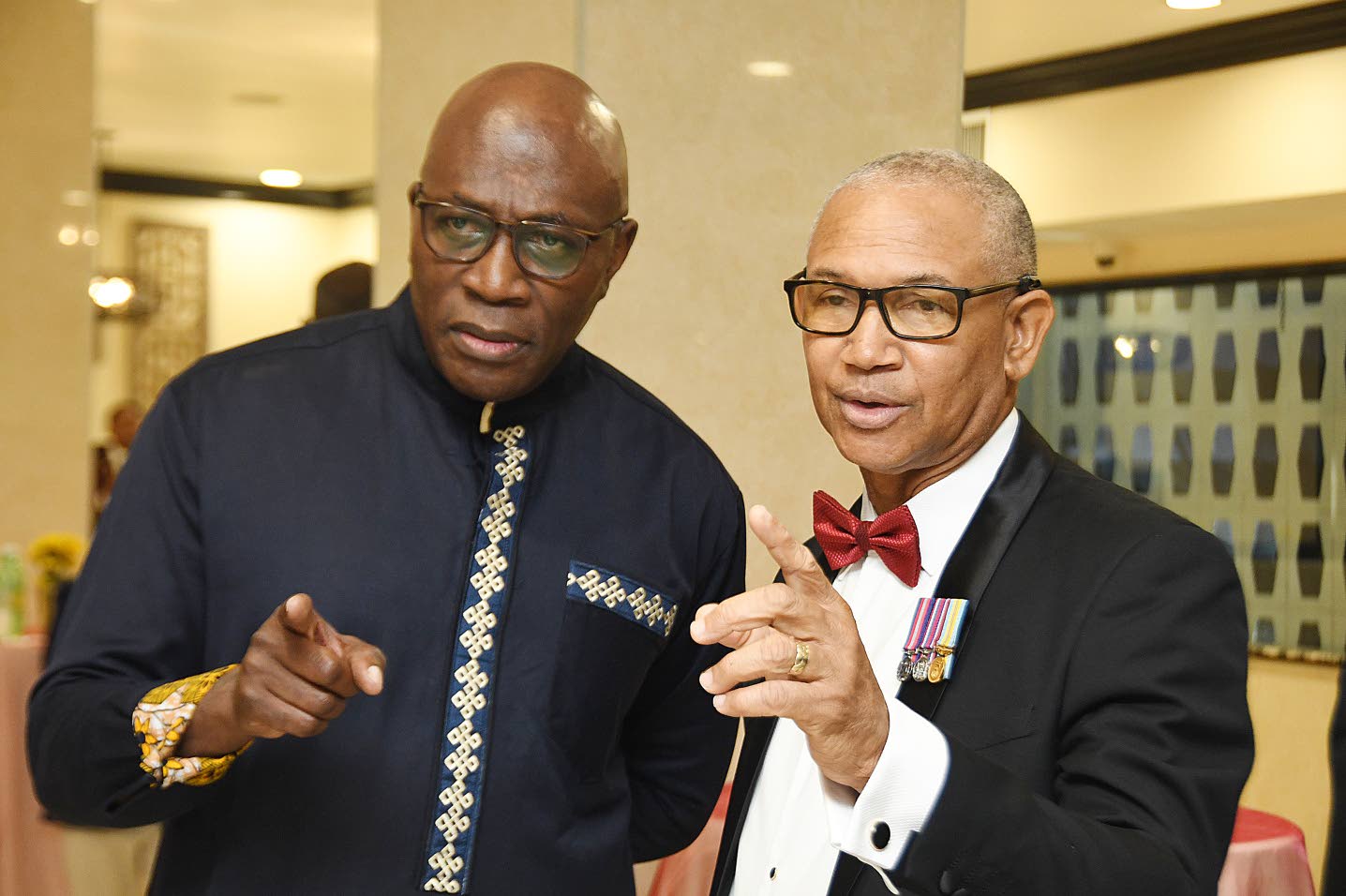 Chief Justice Bryan Sykes (left) with Colonel Rohan Robinson, president of the Wolmer’s Old Boys’ Association, at the WOBA 120th anniversary awards banquet. Photo: Naphtali Junior / Jamaica Observer, 10 September 2026.