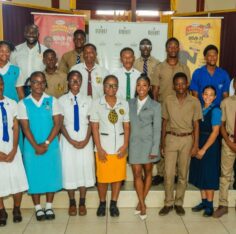 Shelly-Ann Fraser-Pryce, founder and chairwoman of the Pocket Rocket Foundation, and Dr Jermaine McCalpin, executive director, are joined by members of the foundation’s 2026 scholarship cohort following the annual Scholarship Awards at the Wolmer’s Girls’ School Hall in Kingston, on Thursday, Septem