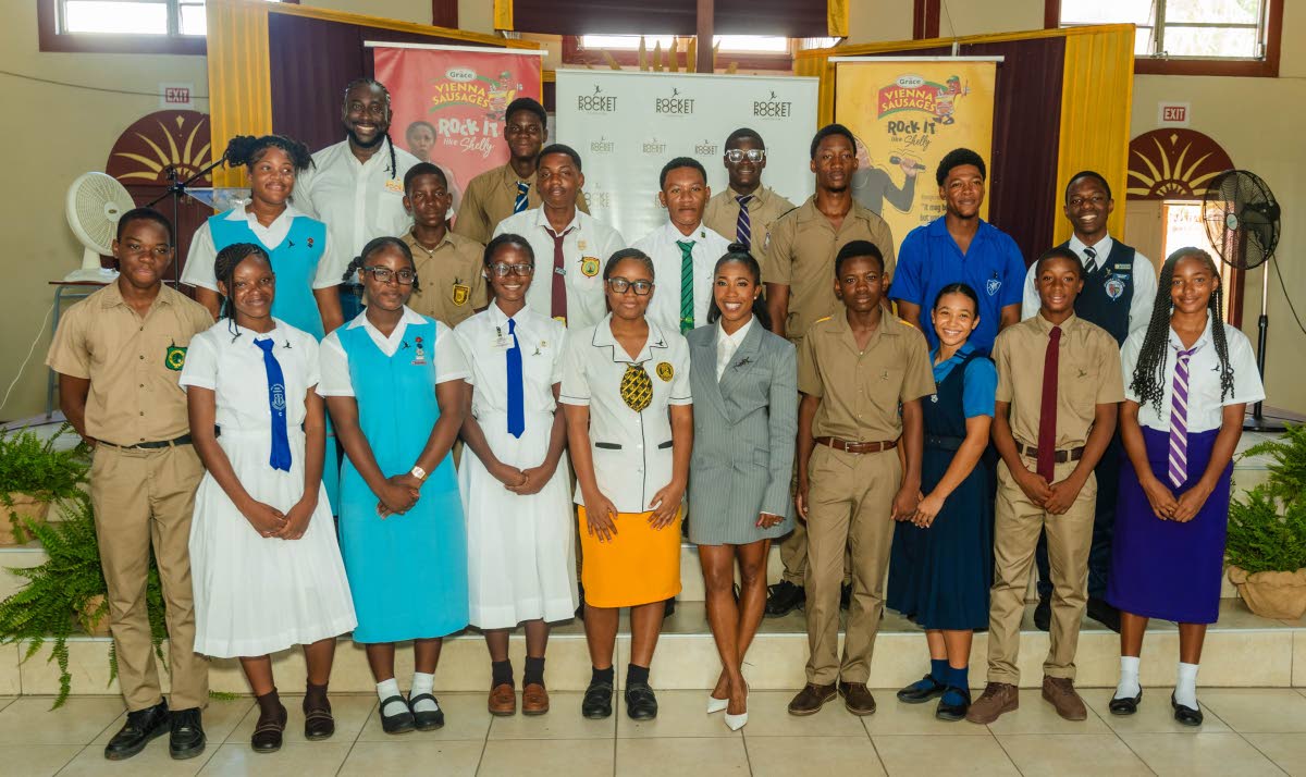 Shelly-Ann Fraser-Pryce, founder and chairwoman of the Pocket Rocket Foundation, and Dr Jermaine McCalpin, executive director, are joined by members of the foundation’s 2026 scholarship cohort following the annual Scholarship Awards at the Wolmer’s Girls’ School Hall in Kingston, on Thursday, September 24. Representing 15 high schools and 10 sporting disciplines, the scholars reflect the foundation’s continued investment in developing Jamaican student-athletes beyond competition, with support that places equal emphasis on academic achievement, personal development, leadership, and preparation for life beyond sport. Photo - Contributed Jamaica Gleaner, October 1, 2026.