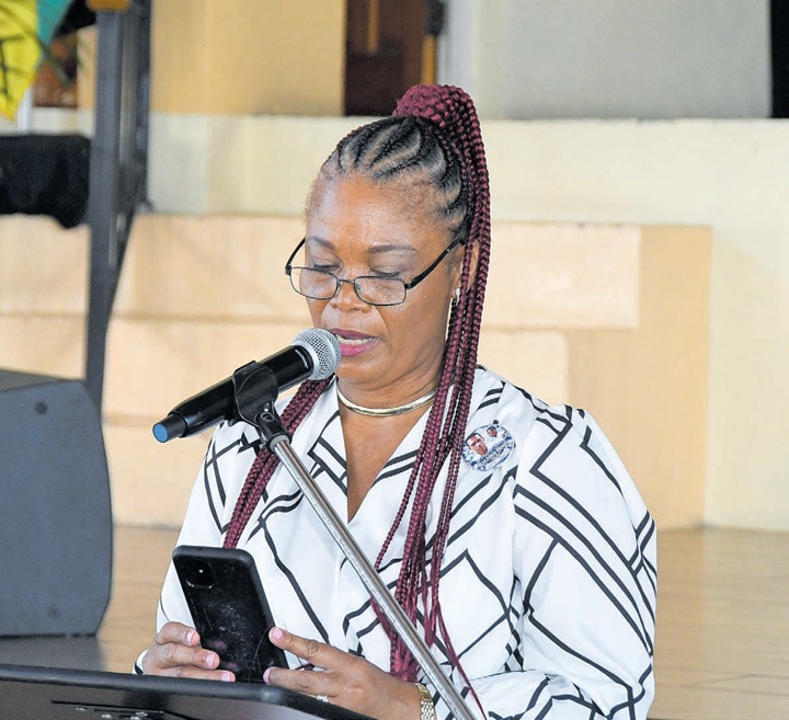 Claudia Stockhausen-Henry, ex-wife of the late veteran journalist Balford Henry, delivers a tribute during the thanksgiving service to celebrate his life on Saturday at Kencot Christian Fellowship in St Andrew. (Photos: Karl Mclarty) Jamaica Observer, October 11, 2026.
